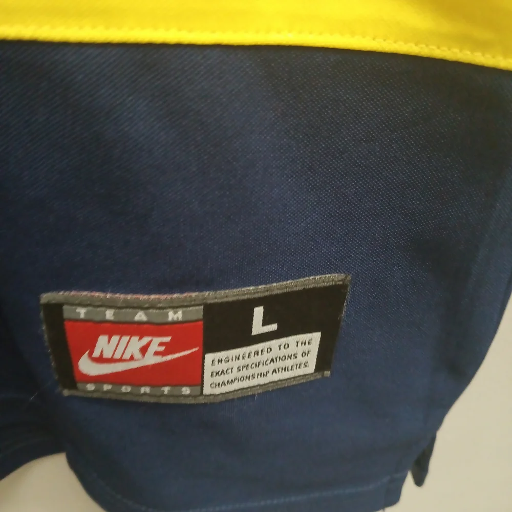 Nike Dark Blue and Yellow Sports Top